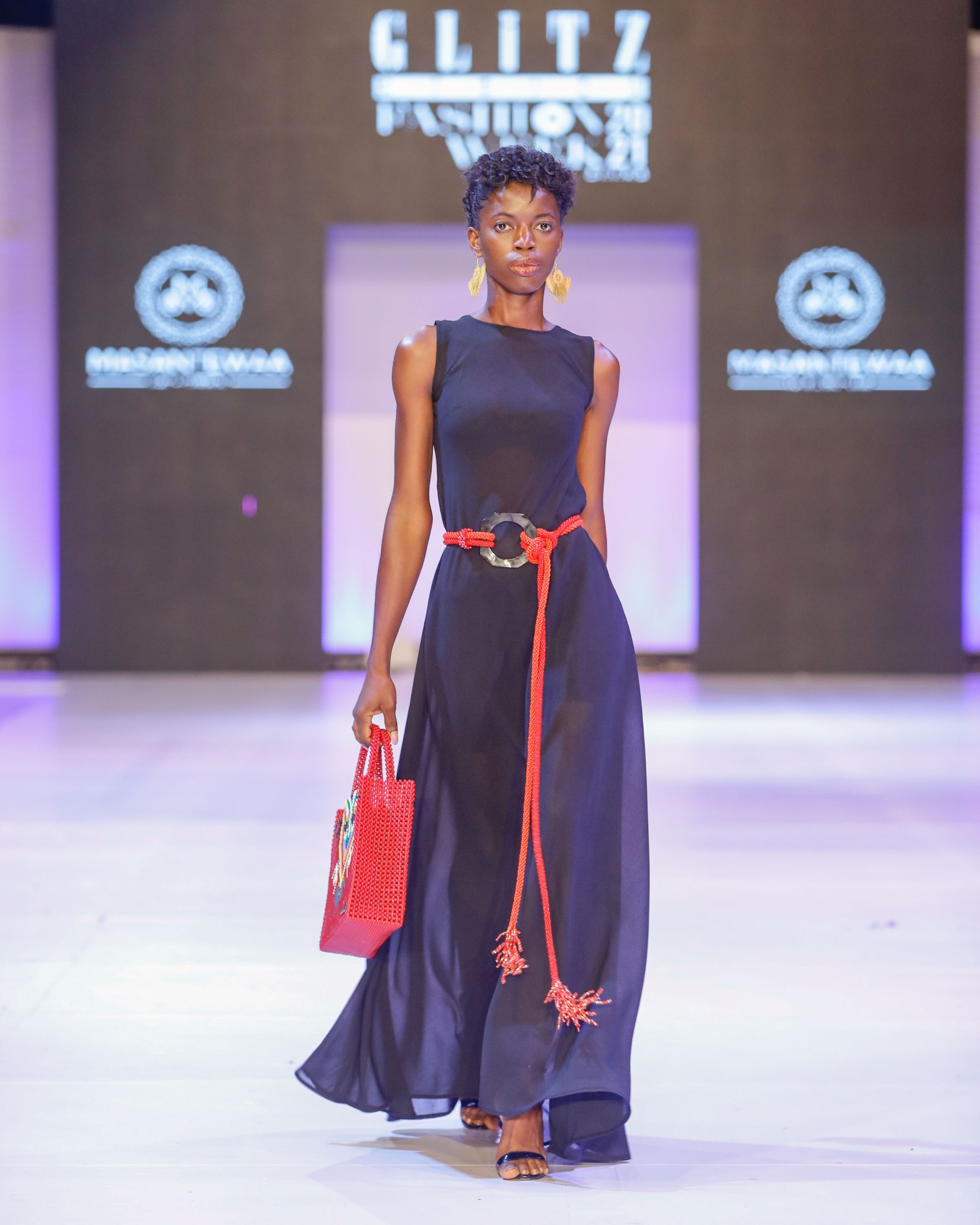 Asantewaa — rope-belt evening look